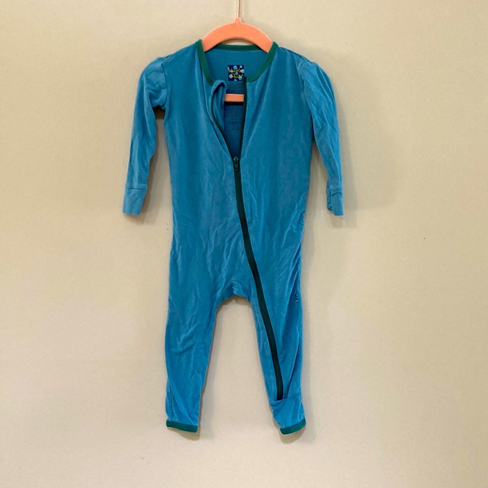 Kickee pants coverall in blue with green trim. Size 9-12 months